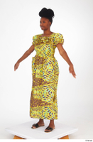  Dina Moses A poses dressed standing whole body yellow long decora apparel african dress 0002.jpg